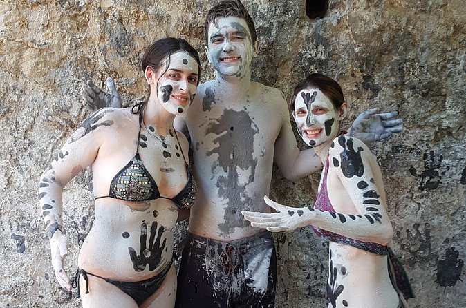Half Day Local Breakfast inclusive, mub bathe and waterfall tour - A coconut farm brings the road down to earth
